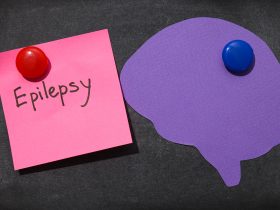 Conceito de dia da epilepsia, maquete de papel, cérebro humano Por AtlasComposer