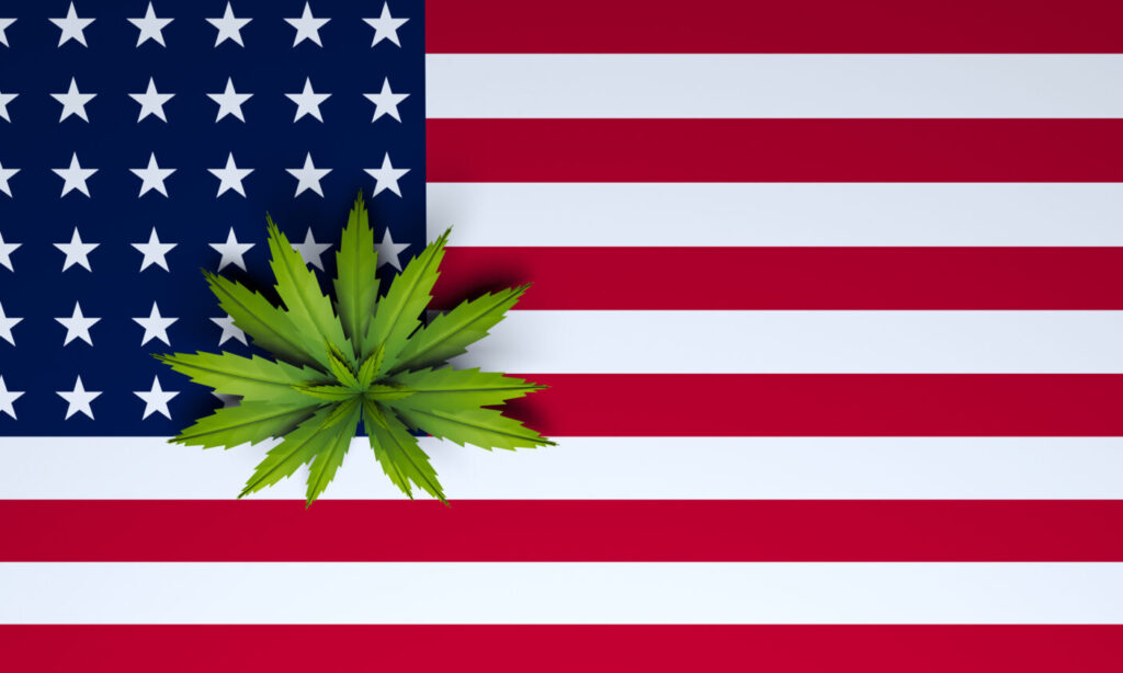 Folha da maconha em cima da bandeira dos Estados Unidos Imagem criada por inteligência artificial