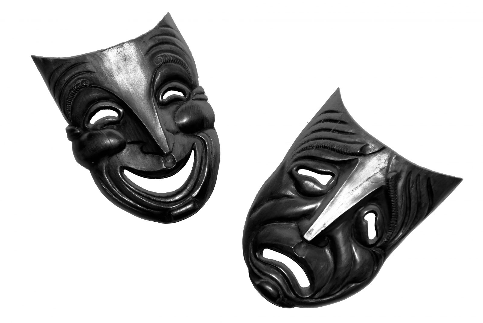 Foto de closeup de máscaras faciais felizes e tristes isoladas no fundo branco Por wirestock